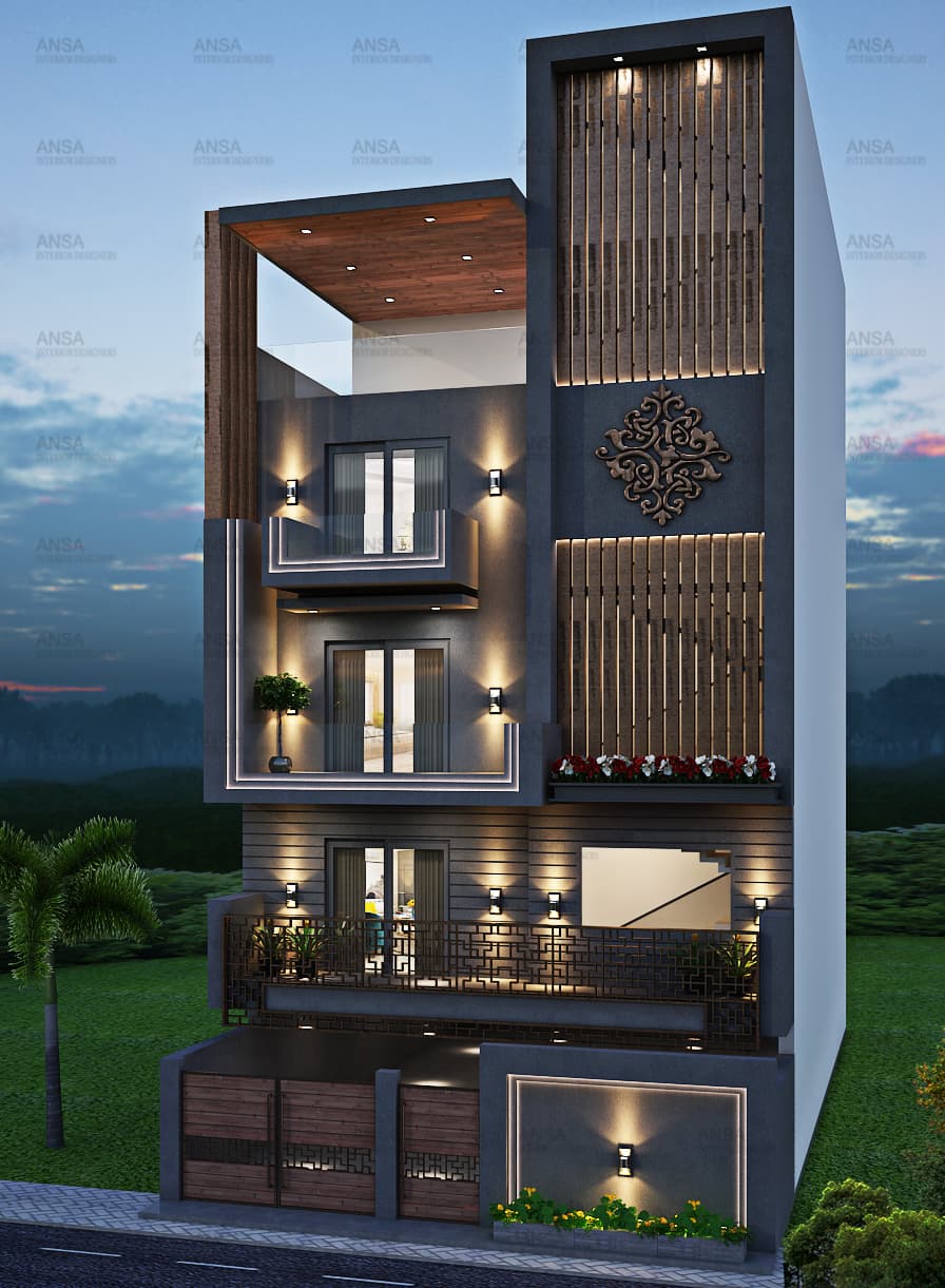 Modern lakeside home with warm interior lighting at dusk
